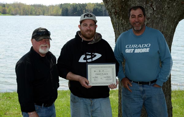 1st Place, Dennis Shearme and Sam Rankin with Pat DeVincenzo of Angling Sports (right). 