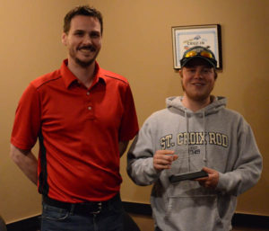 2015 Angler of the Year winner Cole Bailey (right) with club president Mark Biesinger.