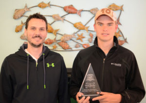 2015 Junior Angler of the Year winner Owen Mueller (right) with club president Mark Biesinger.